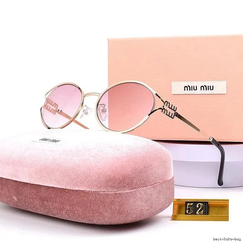 Miu Miu Statement Oversized sunglasses Black Oval Sunglasses for Easy Pairing