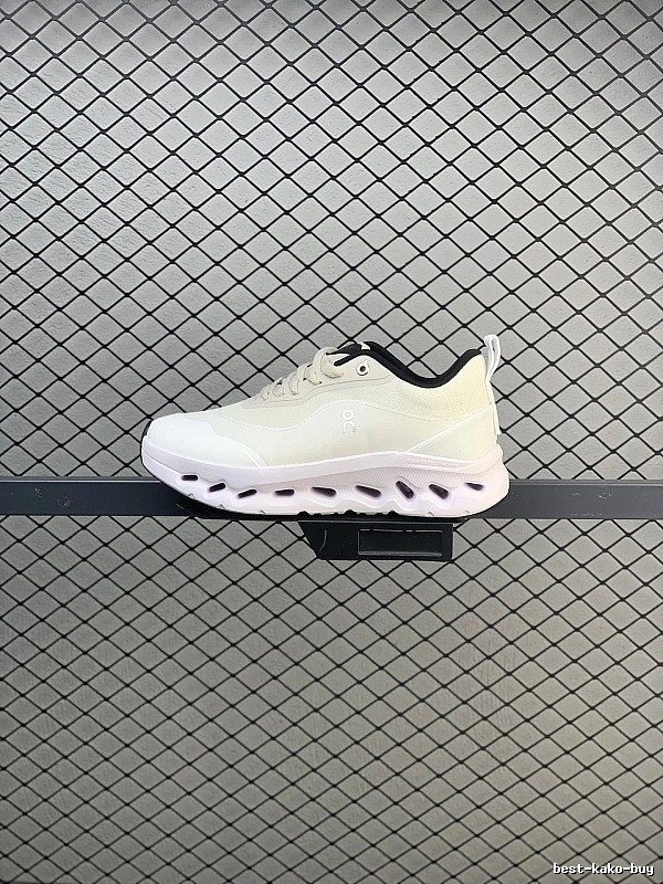 On Cloud Runners in White and Black, Finished with Layered Mesh Upper