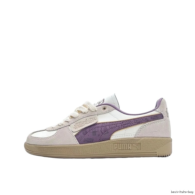 PUMA retro-style purple and white sports shoes